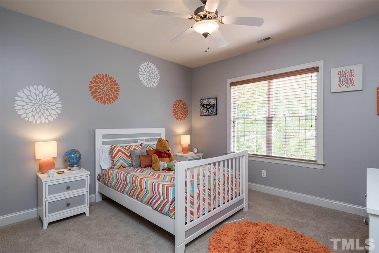 11511 Azari Court Raleigh, NC 27614 - Photo 16 of 25 a bedroom with a bed and a window