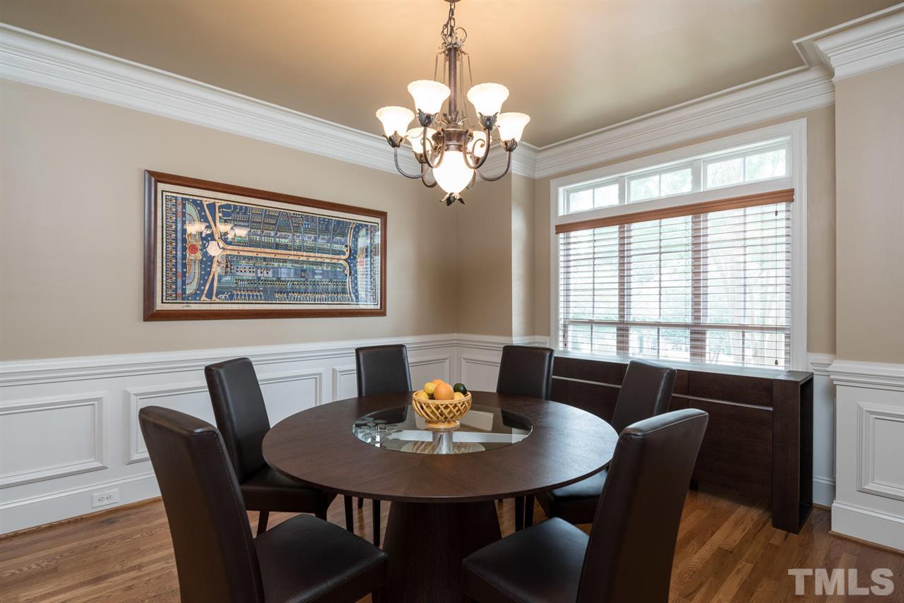 11511 Azari Court Raleigh, NC 27614 - Photo 3 of 25 a view of a dining room with furniture window and wooden floor