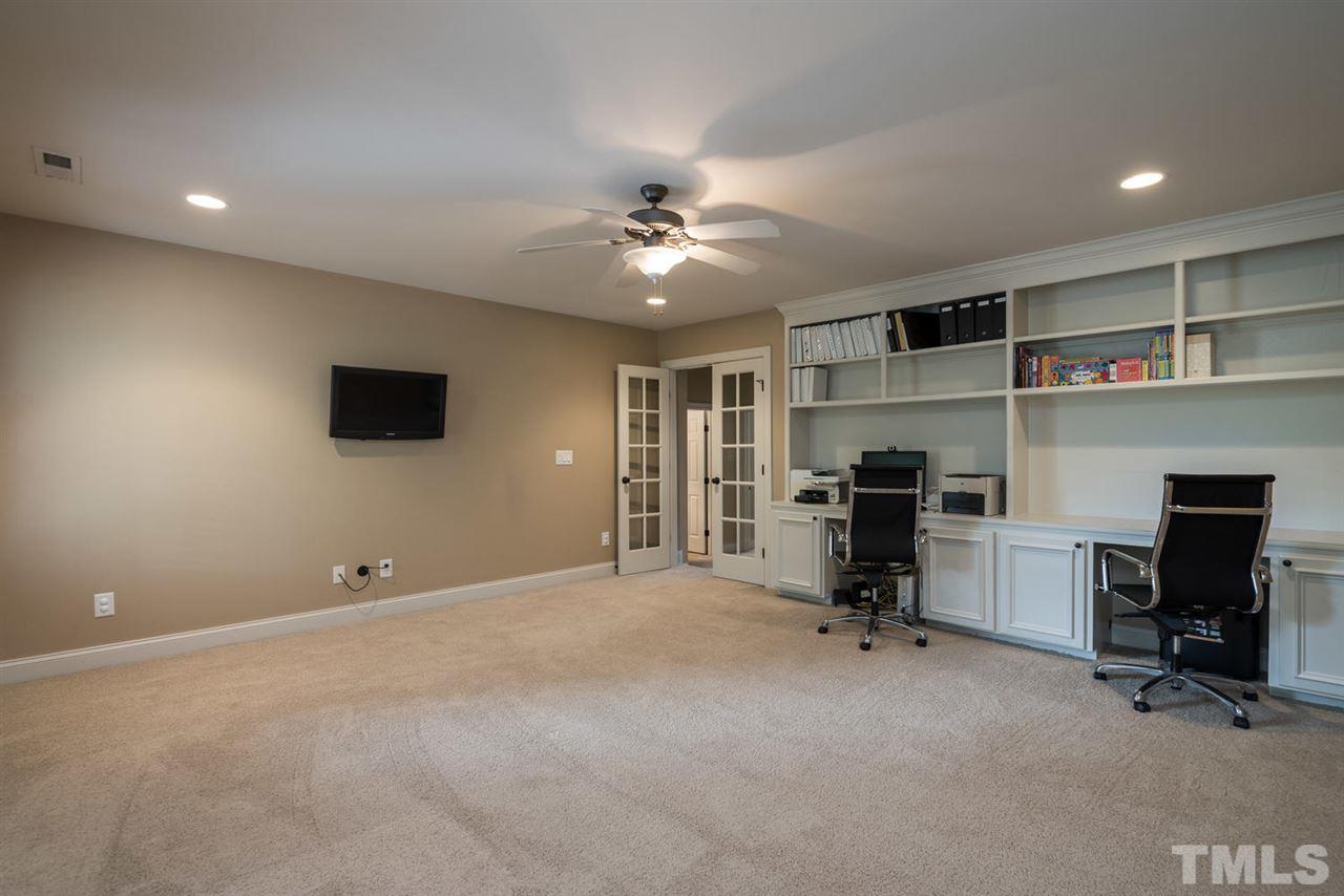 11511 Azari Court Raleigh, NC 27614 - Photo 21 of 25 a view of a livingroom with furniture and a fireplace