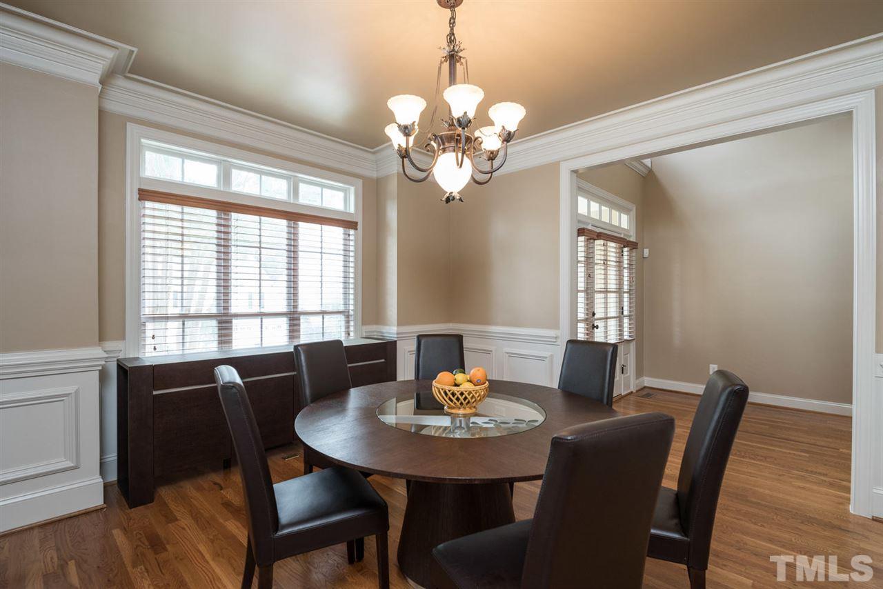 11511 Azari Court Raleigh, NC 27614 - Photo 4 of 25 a view of a dining room with furniture window and wooden floor