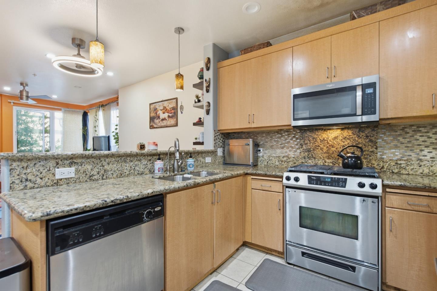 1101 South Main Street, Unit 212 Milpitas, CA 95035 - Photo 1 of 24 a kitchen with a stove and a sink