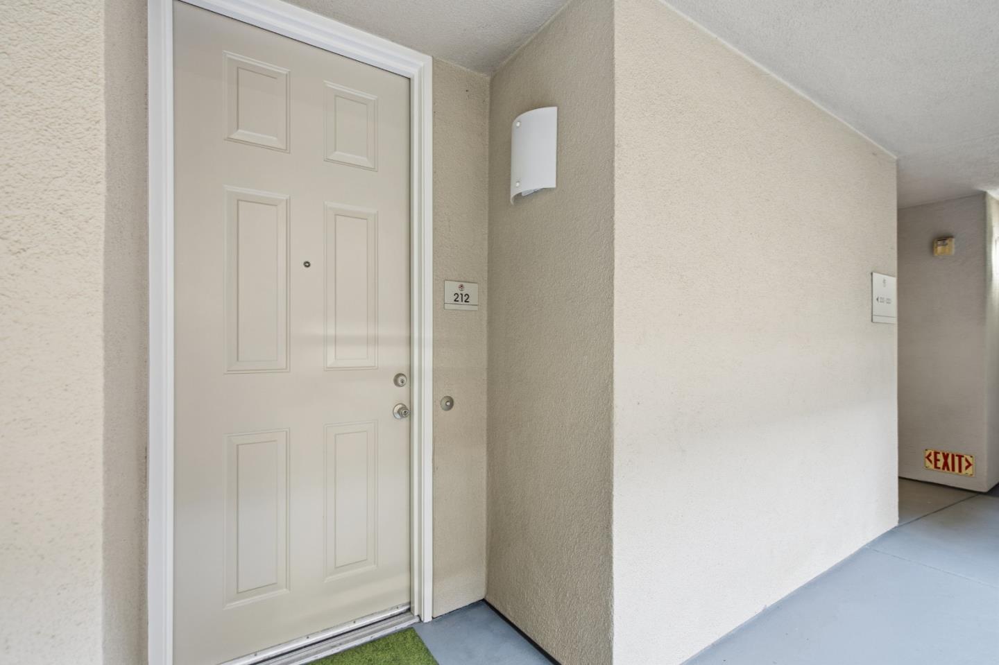 1101 South Main Street, Unit 212 Milpitas, CA 95035 - Photo 15 of 24 a view of a hallway with closet