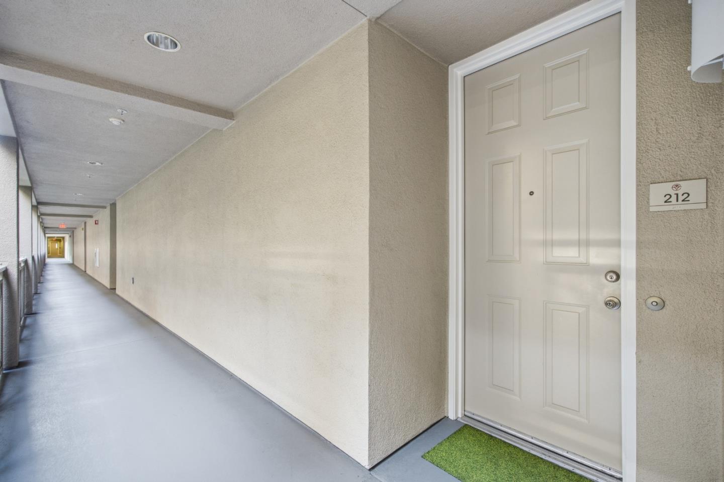 1101 South Main Street, Unit 212 Milpitas, CA 95035 - Photo 16 of 24 a view of an entryway with hallway