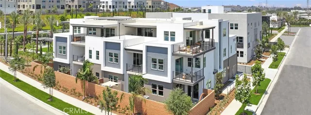 a view of a porch with furniture and garden