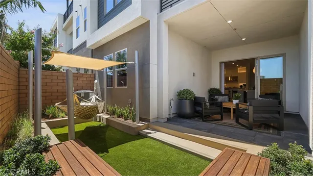 a backyard of a house with seating space