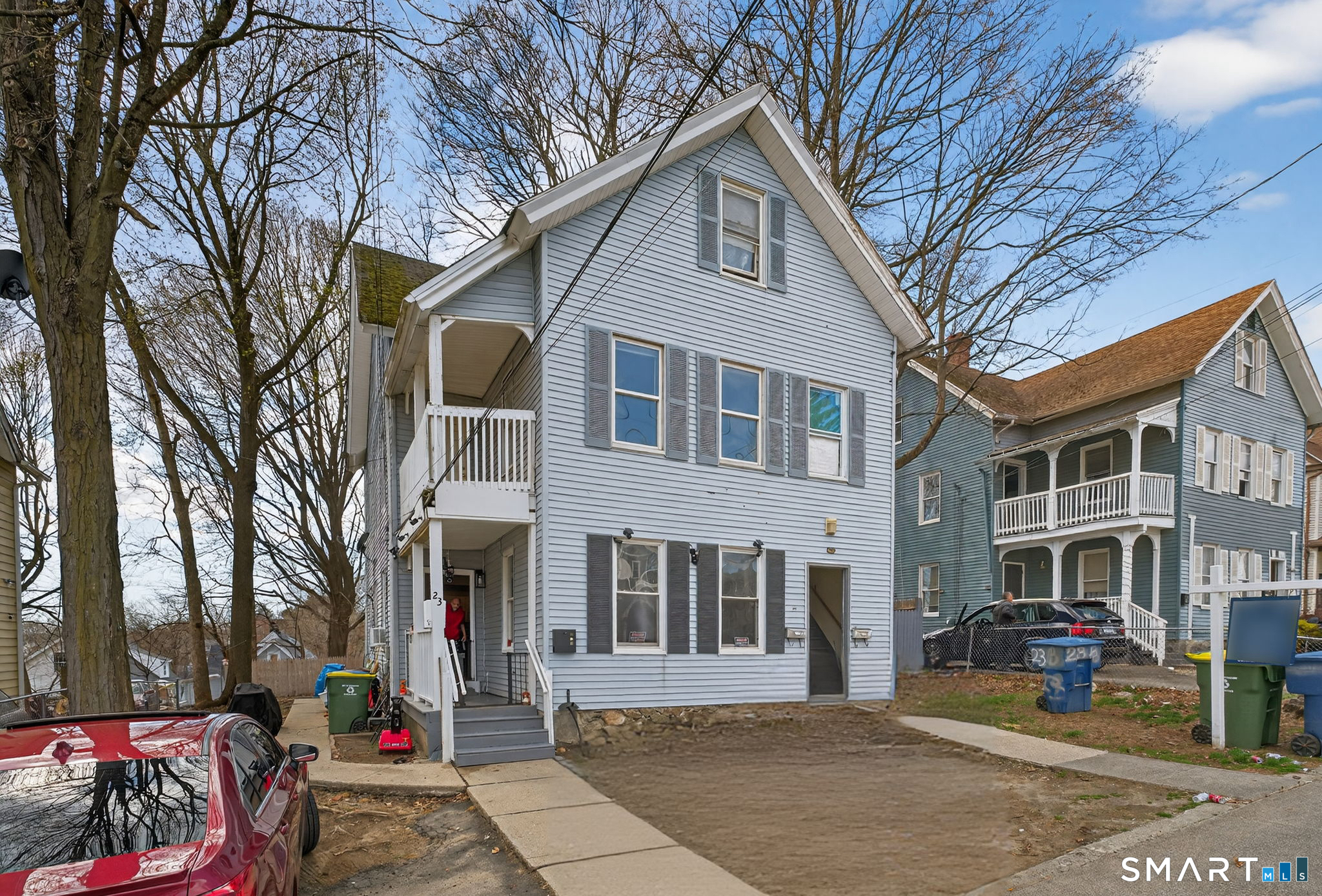 23 Beacon Street, Unit 2 Waterbury, CT 06704 - Photo 1 of 1 a front view of a building with many windows