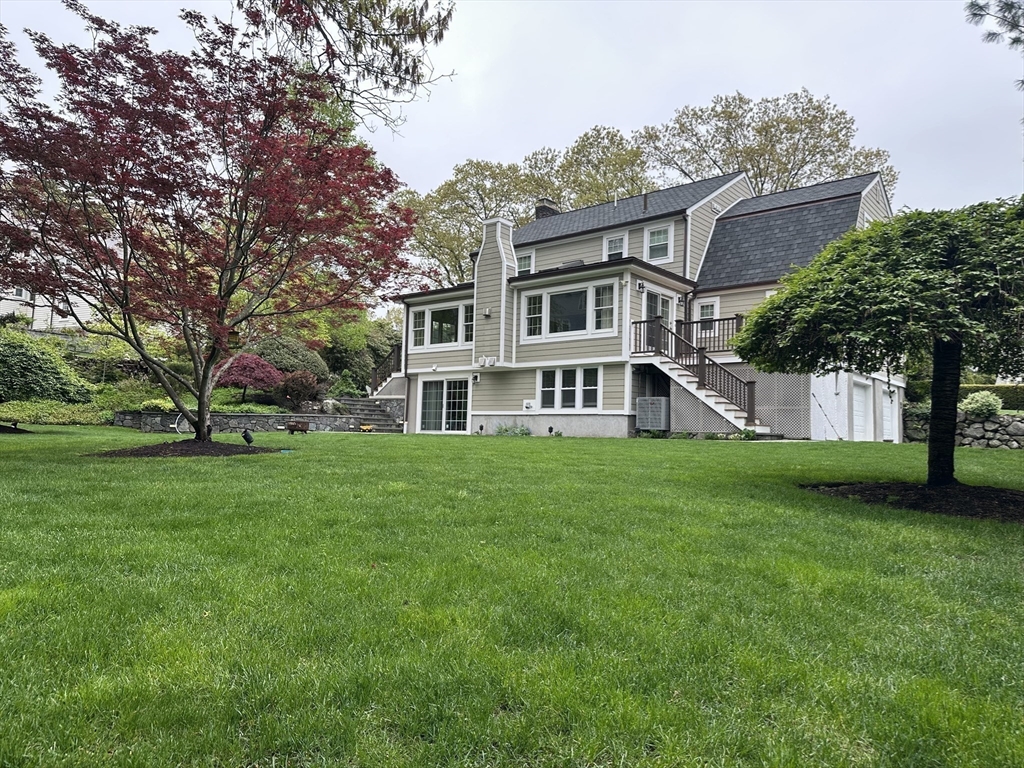 45 Wellesley Road Belmont, MA 02478 - Photo 38 of 42 a front view of a house with a garden