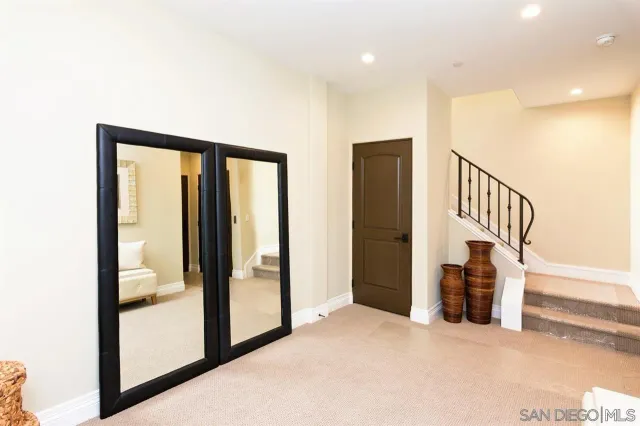 a view of hallway with stairs