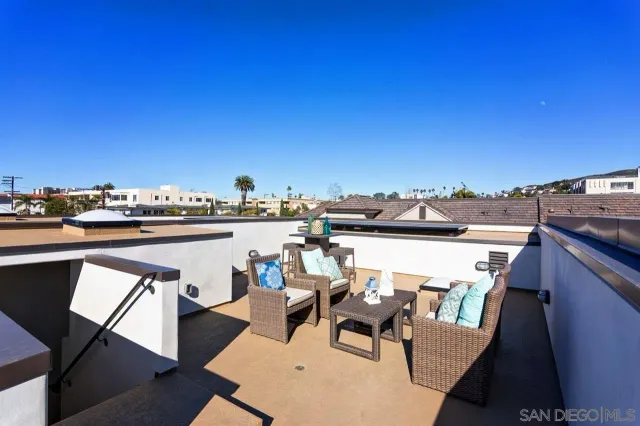 a view of a terrace with sitting area