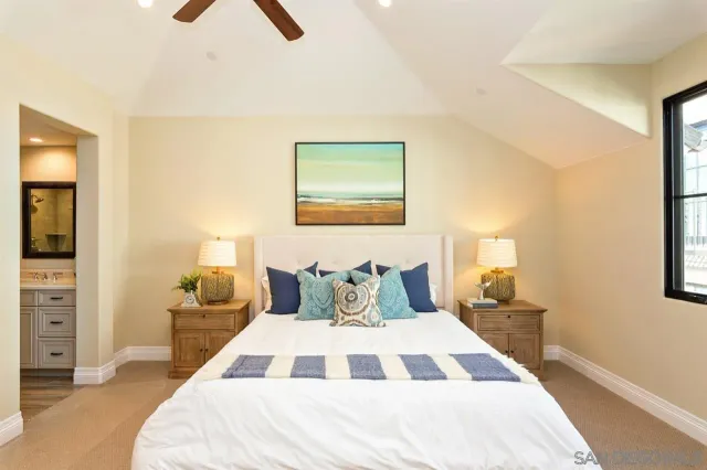 a bedroom with a bed and walk in closet