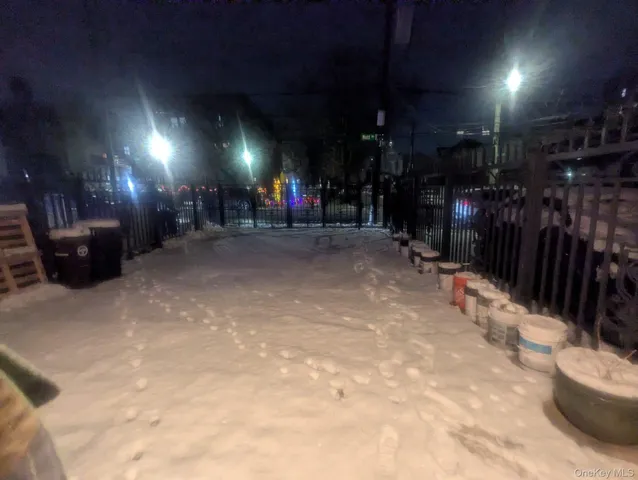 a view of empty room with a fireplace