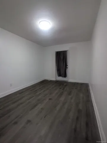 a bathroom with a shower a toilet and sink