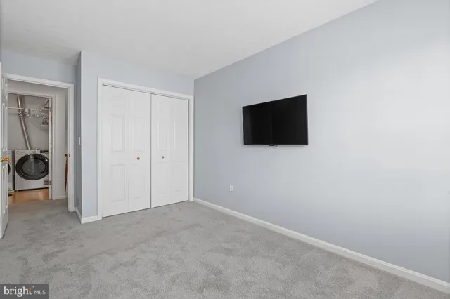a view of a livingroom with a flat screen tv