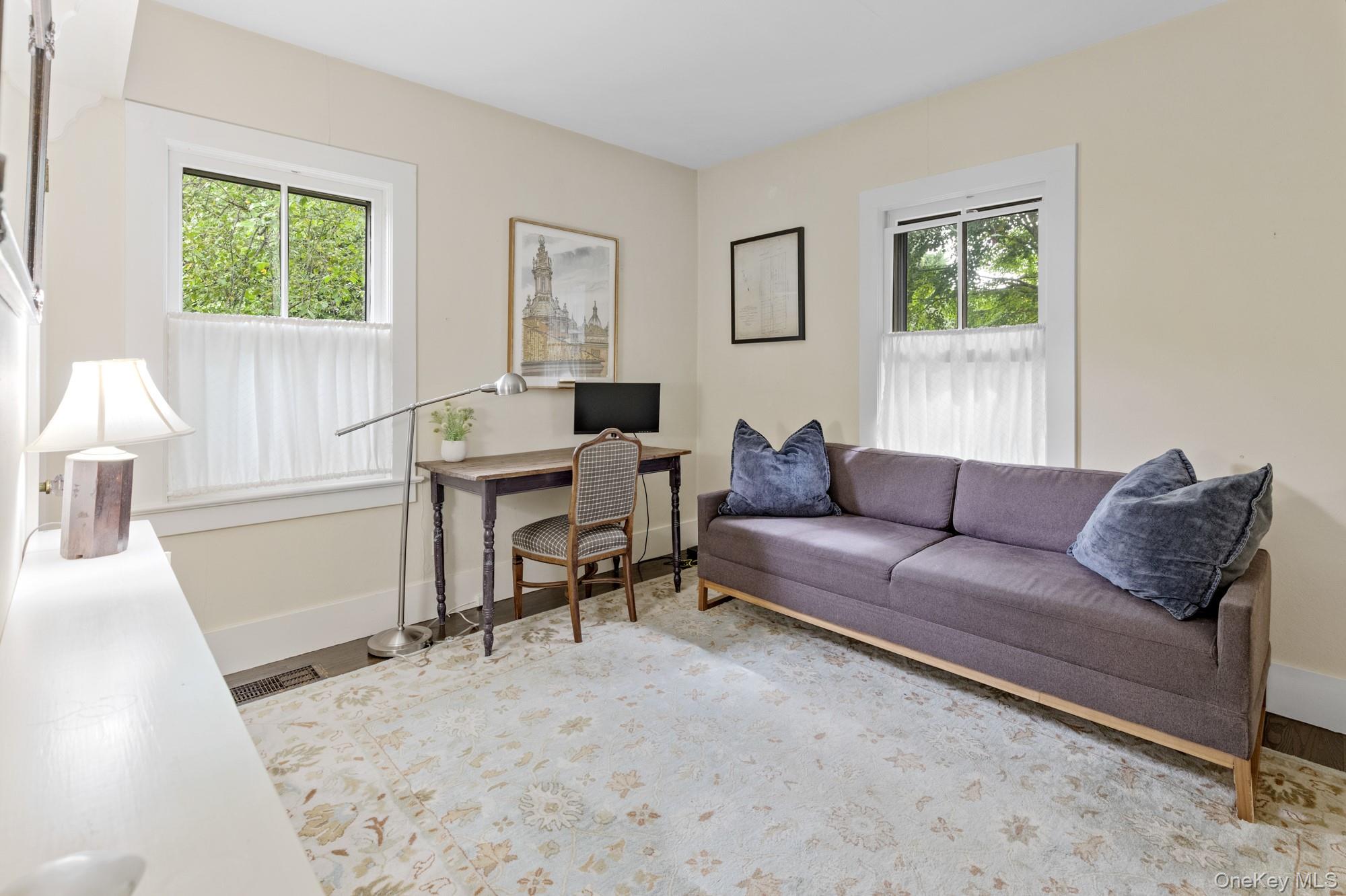 10 Pleasant Lane East Hampton, NY 11937 - Photo 11 of 15 a living room with furniture and a window