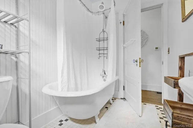a bathroom with a sink and shower