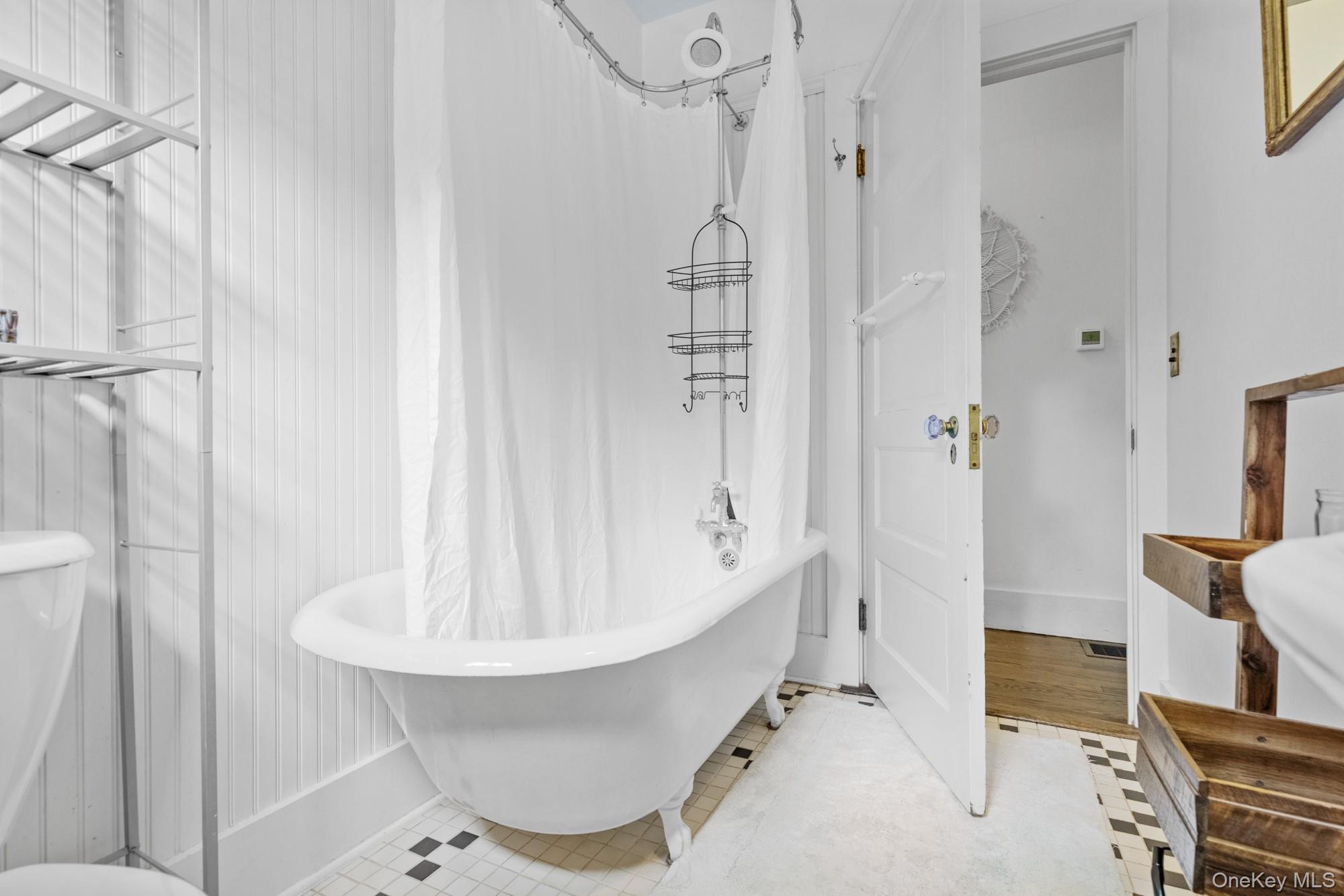 10 Pleasant Lane East Hampton, NY 11937 - Photo 12 of 15 a bathroom with a sink and shower