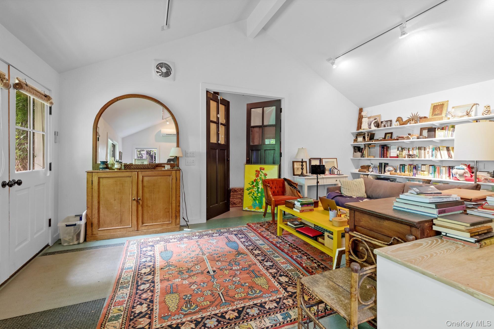 10 Pleasant Lane East Hampton, NY 11937 - Photo 2 of 15 a living room with furniture and a wooden floor