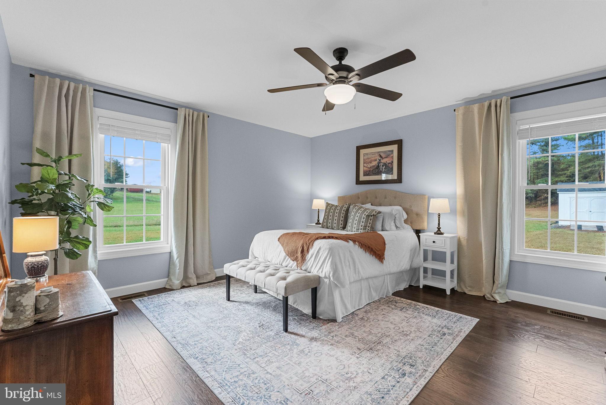 21287 Sparta Road Milford, VA 22514 - Photo 25 of 35 Serene bedroom with natural light and charm.