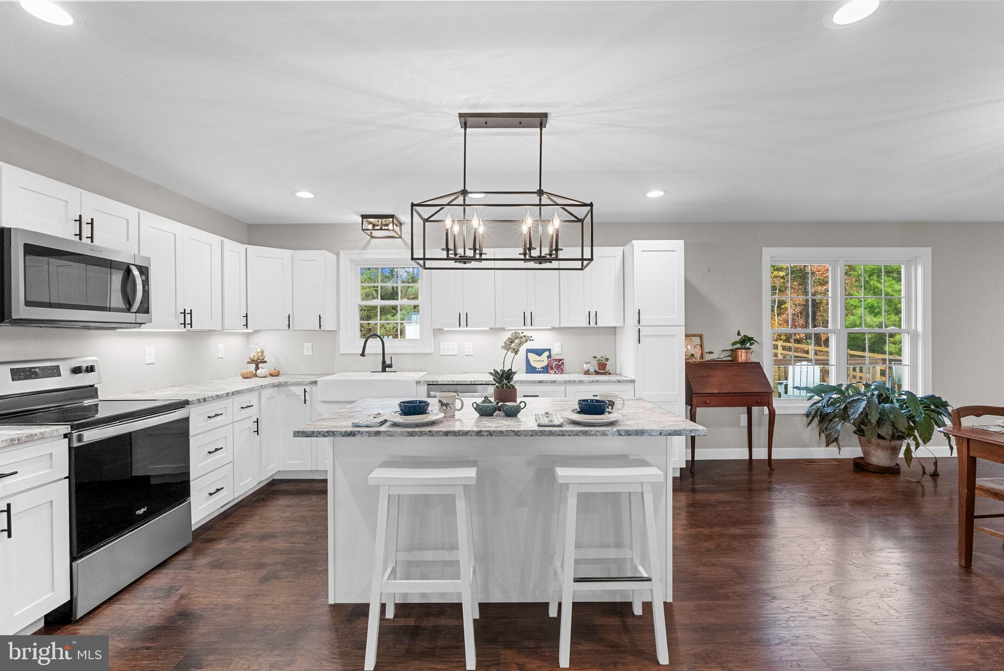 21287 Sparta Road Milford, VA 22514 - Photo 9 of 35 Bright and modern kitchen with elegant finishes.