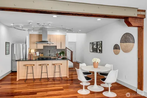 a kitchen with a stove and cabinets