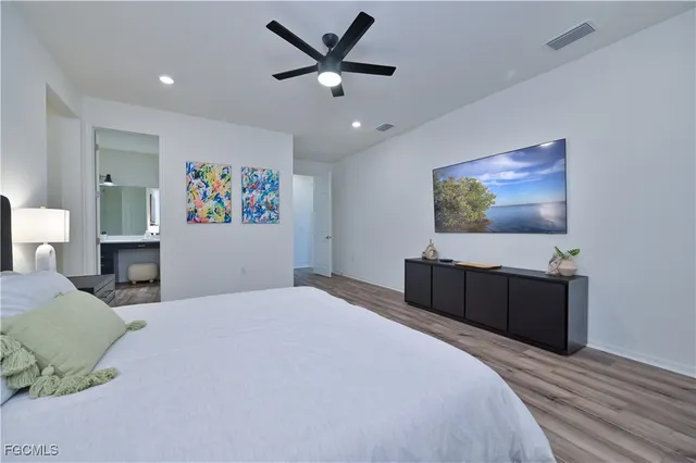 a bathroom with a sink double vanity and shower