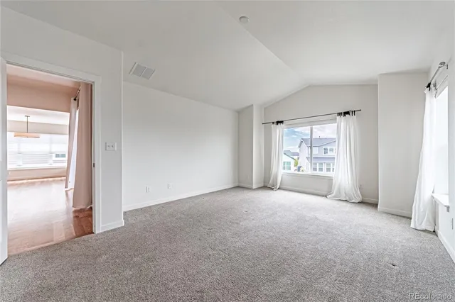 a view of empty room with front door