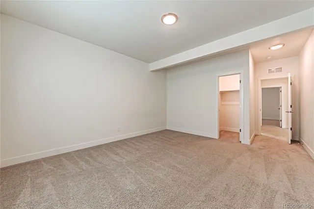 an empty room with a bathroom