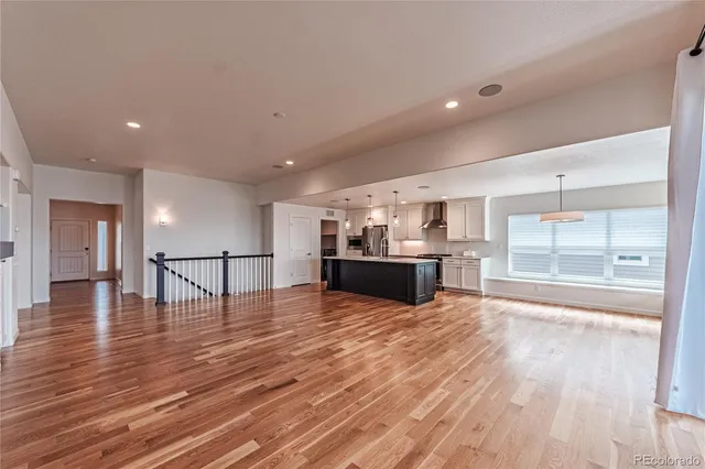 a view of kitchen and kitchen with a wooden floor