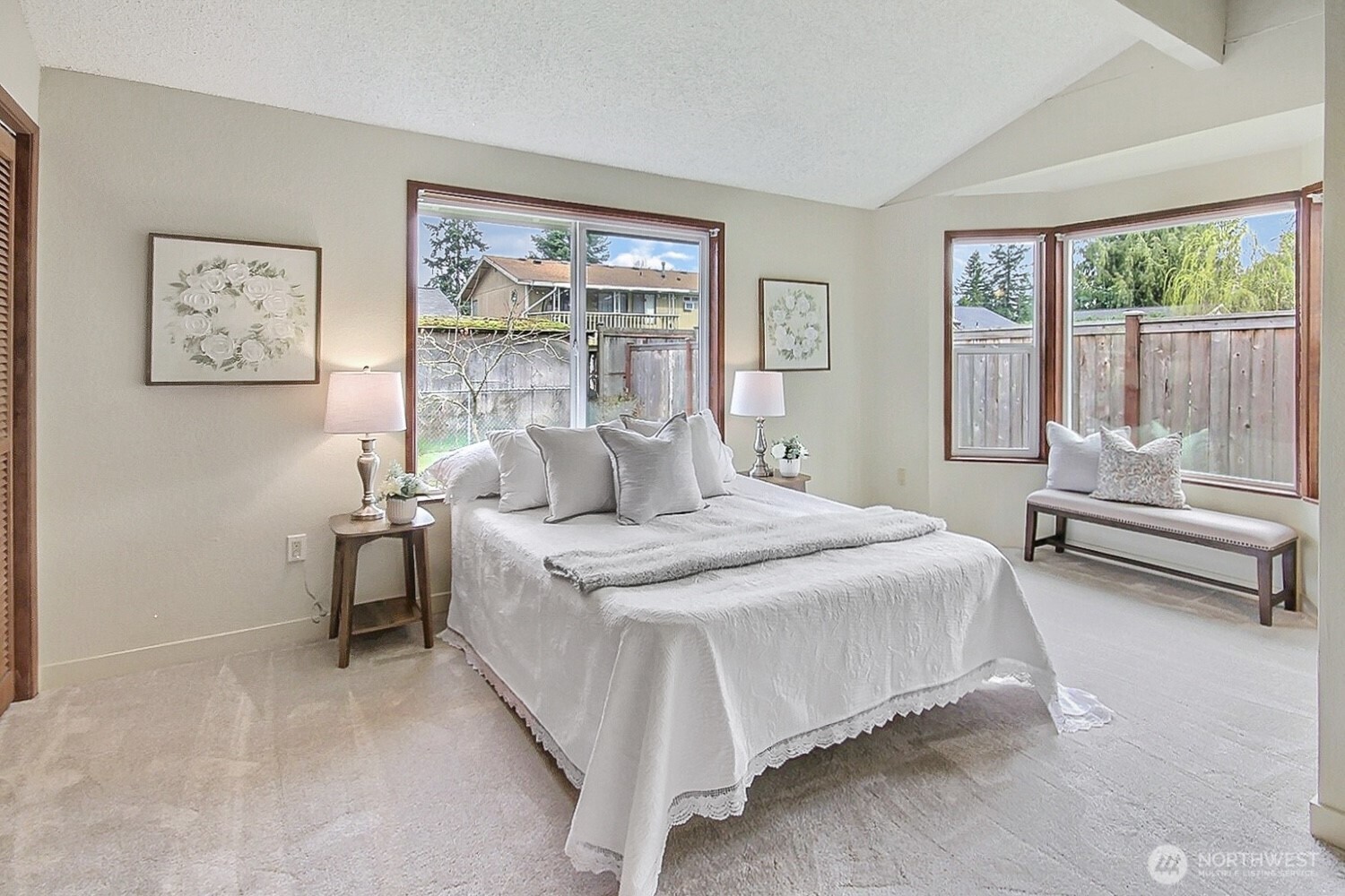 21834 Southeast 265th Way Maple Valley, WA 98038 - Photo 18 of 31 a spacious bedroom with a bed and a large window