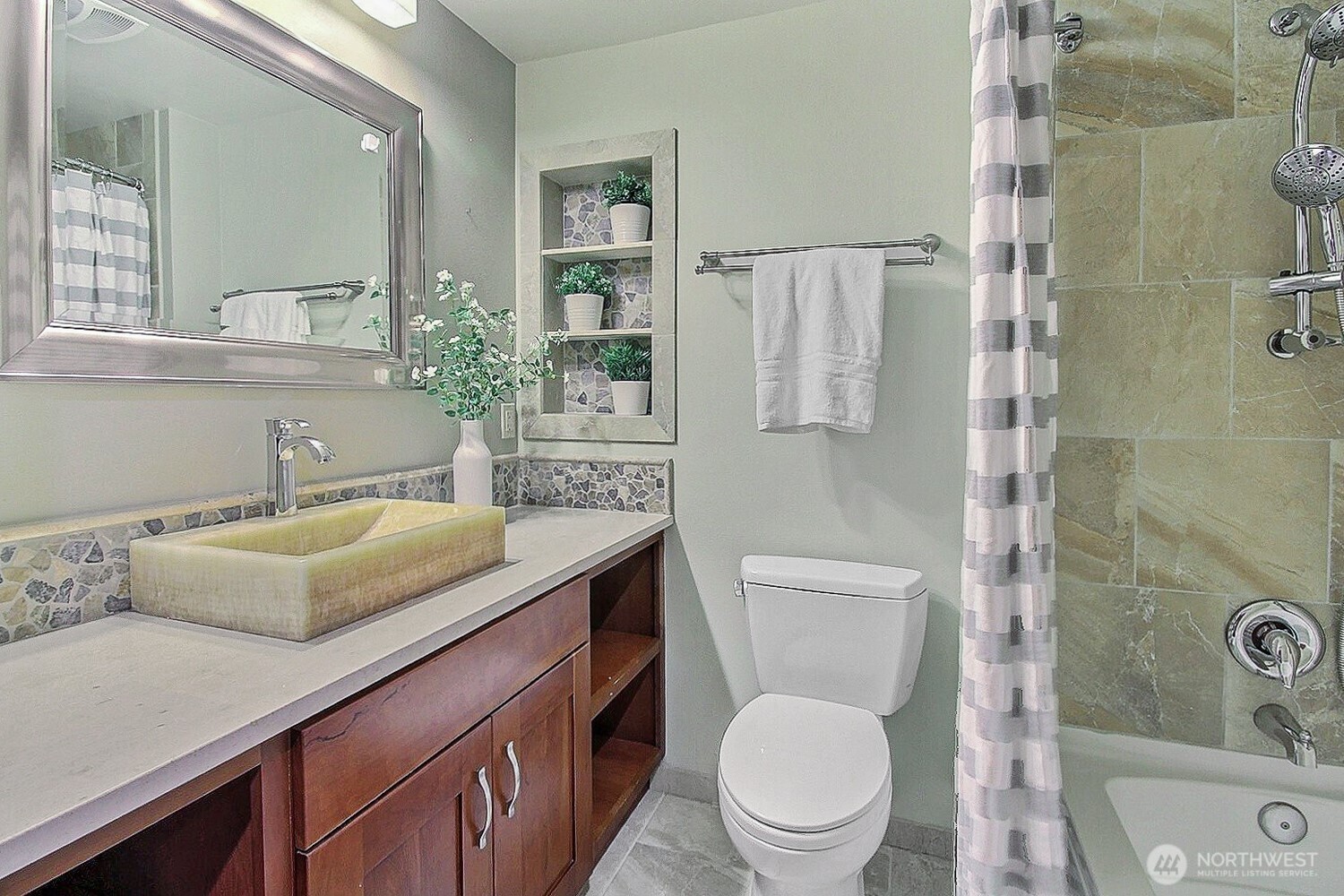 21834 Southeast 265th Way Maple Valley, WA 98038 - Photo 22 of 31 a bathroom with a granite countertop sink a toilet a mirror and shower