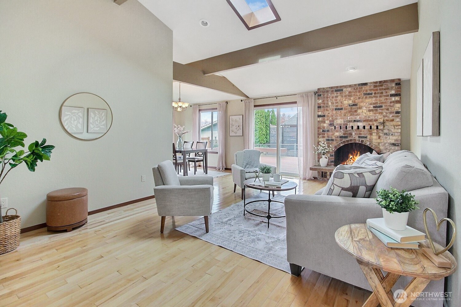 21834 Southeast 265th Way Maple Valley, WA 98038 - Photo 4 of 31 a living room with furniture and a fireplace