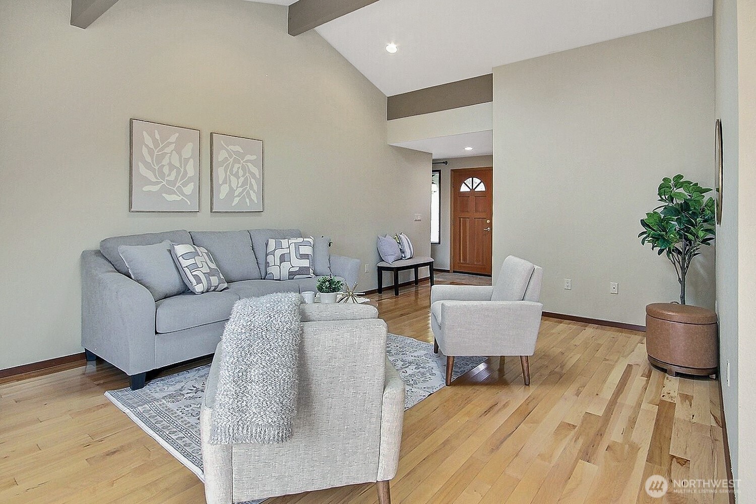 21834 Southeast 265th Way Maple Valley, WA 98038 - Photo 6 of 31 a living room with furniture and a potted plant