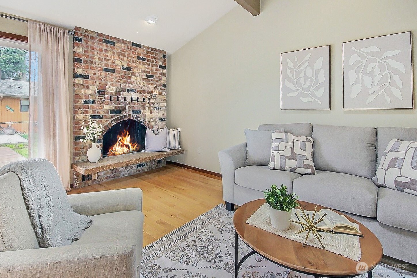 21834 Southeast 265th Way Maple Valley, WA 98038 - Photo 7 of 31 a living room with furniture and a fireplace