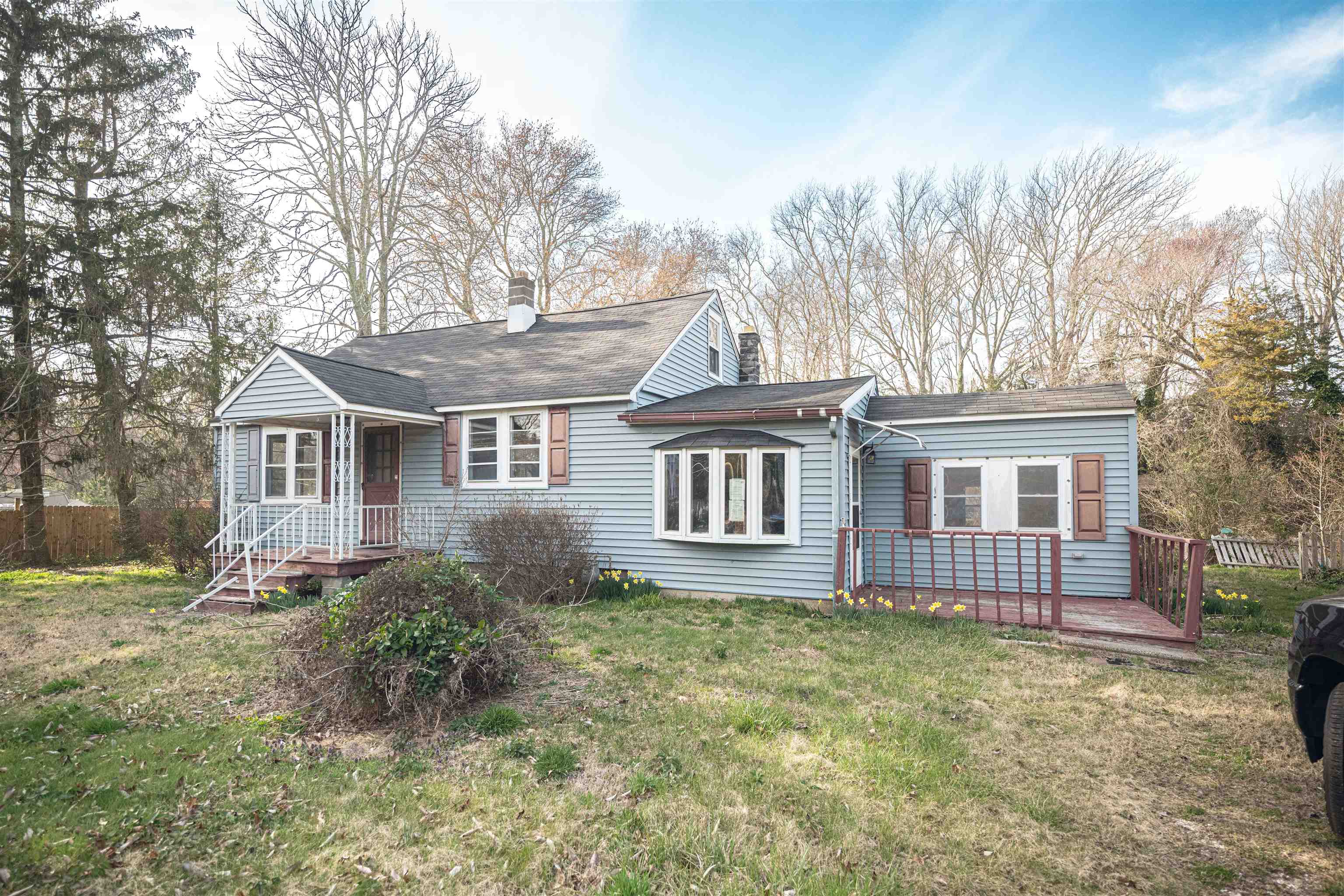768 Seashore Road Cape May, NJ 08204 - Photo 3 of 12 a front view of a house with a garden