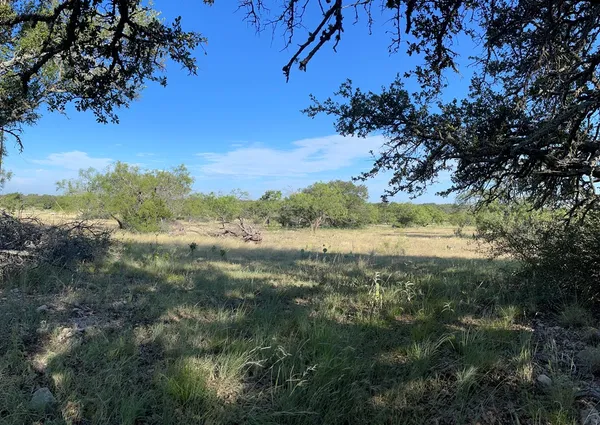 a view of lake with mountain