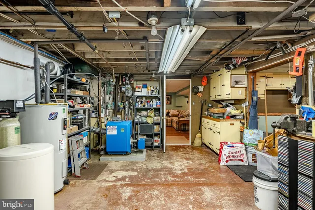 a view of a house with a yard and garage