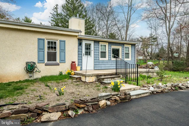 an aerial view of residential house with outdoor space