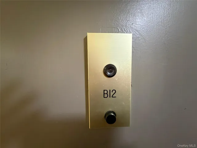 a balcony with a bench and trees