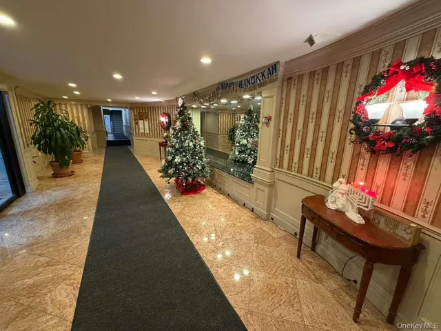a view of a lobby with a potted plant