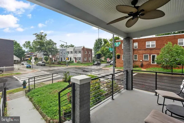 a view of a porch and a yard
