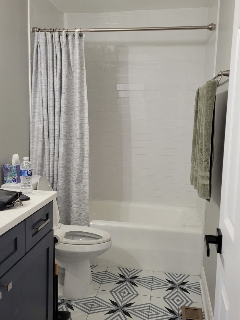 1100 Holbrook Road, Unit H Homewood, IL 60430 - Photo 11 of 13 a bathroom with a sink toilet and shower