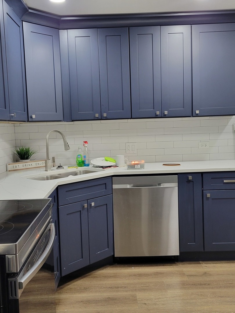 1100 Holbrook Road, Unit H Homewood, IL 60430 - Photo 7 of 13 a kitchen with a sink and cabinets