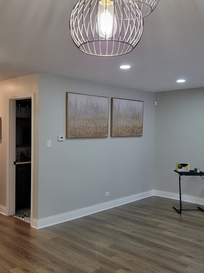 1100 Holbrook Road, Unit H Homewood, IL 60430 - Photo 8 of 13 a view of entryway with wooden floor