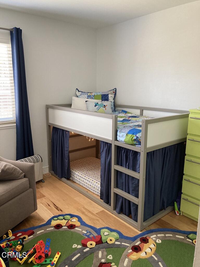 1711 Masthead Drive Oxnard, CA 93035 - Photo 14 of 28 a bedroom with a bed and a window