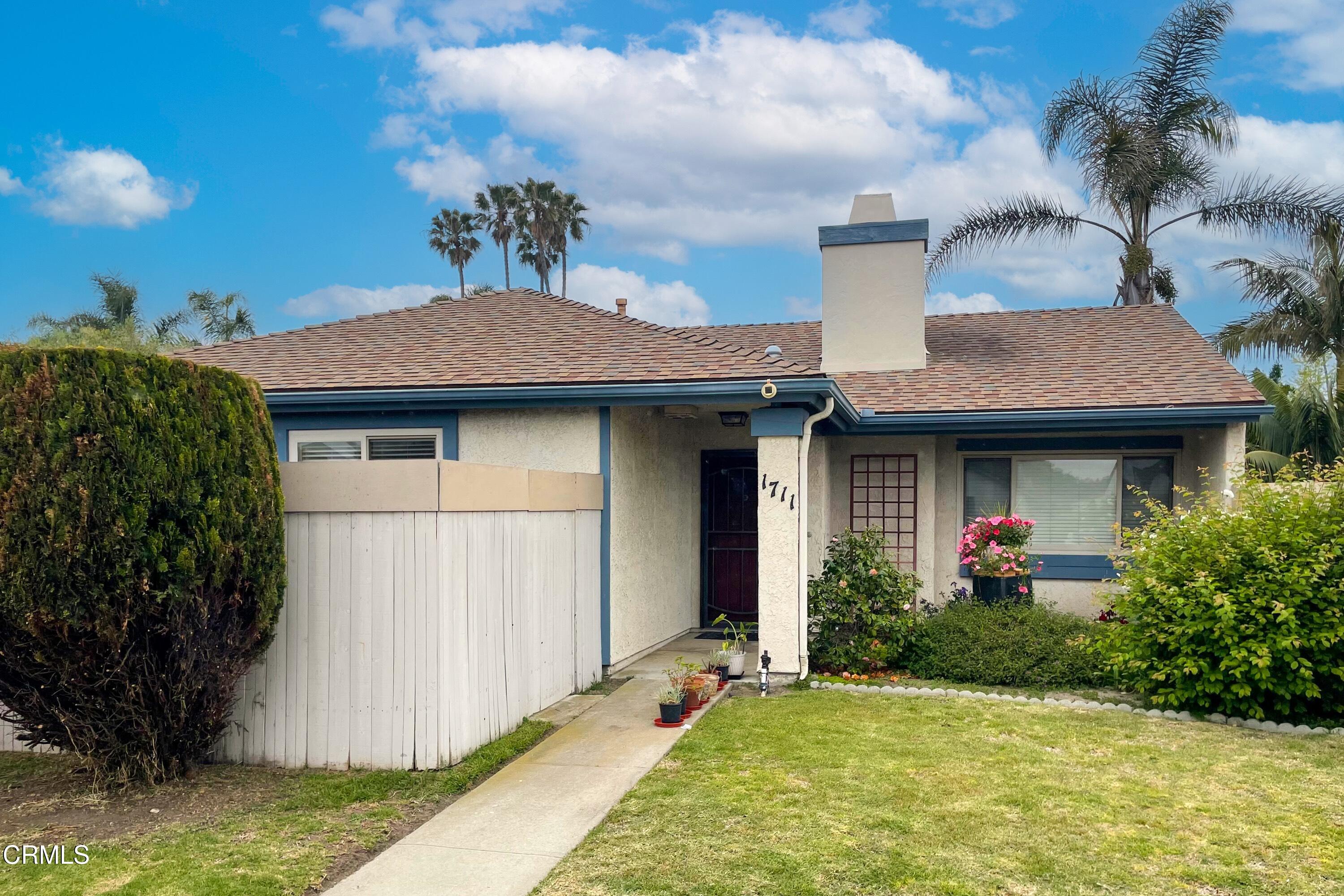 1711 Masthead Drive Oxnard, CA 93035 - Photo 27 of 28 a front view of a house with garden