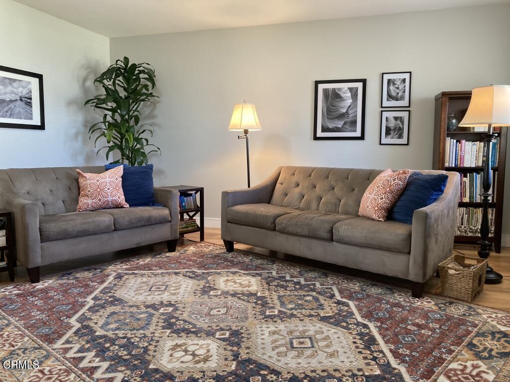 1711 Masthead Drive Oxnard, CA 93035 - Photo 5 of 28 a living room with furniture and a lamp