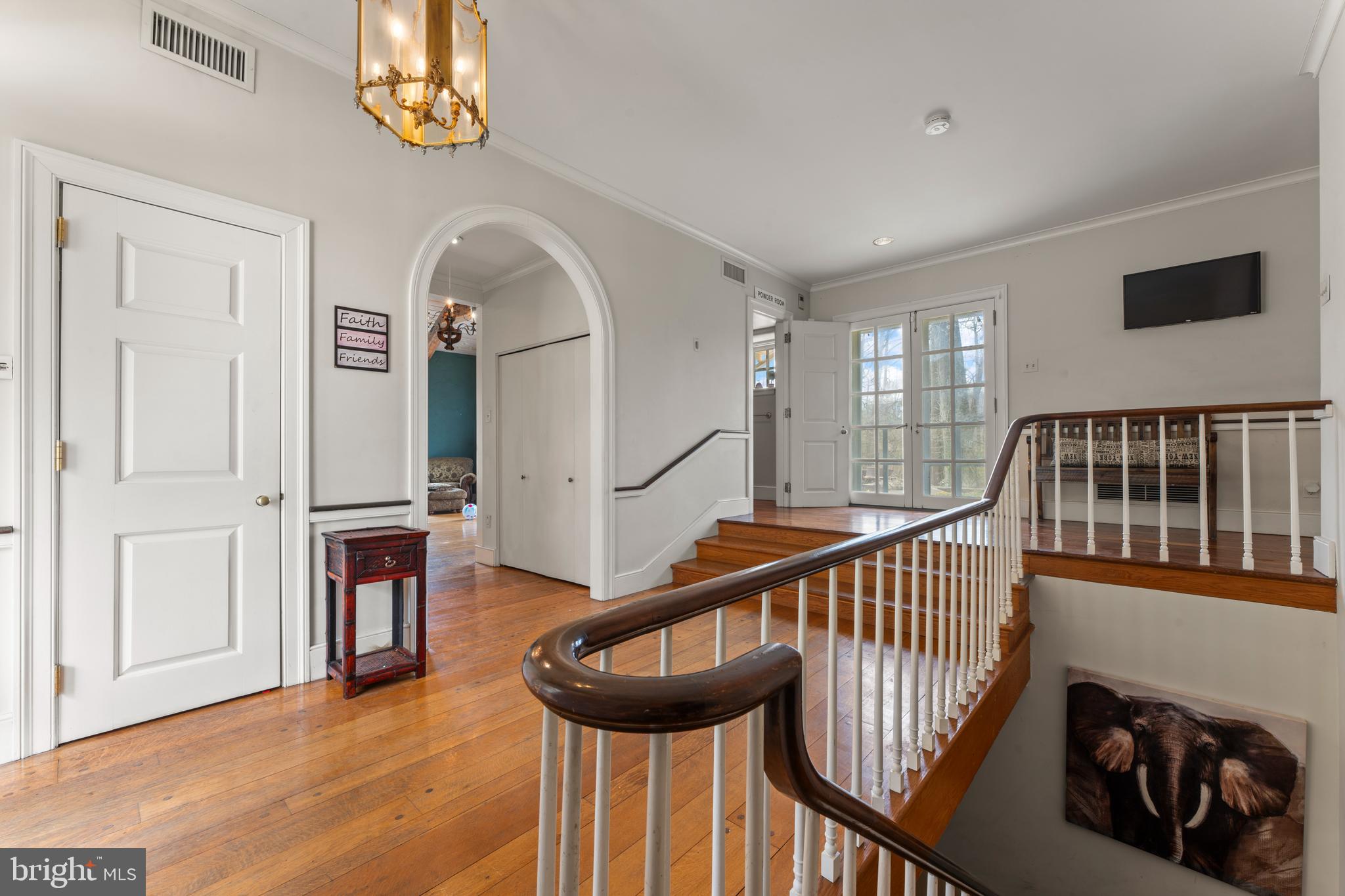 2141 Paper Mill Road Huntingdon Valley, PA 19006 - Photo 13 of 58 a view of entryway and hall with wooden floor