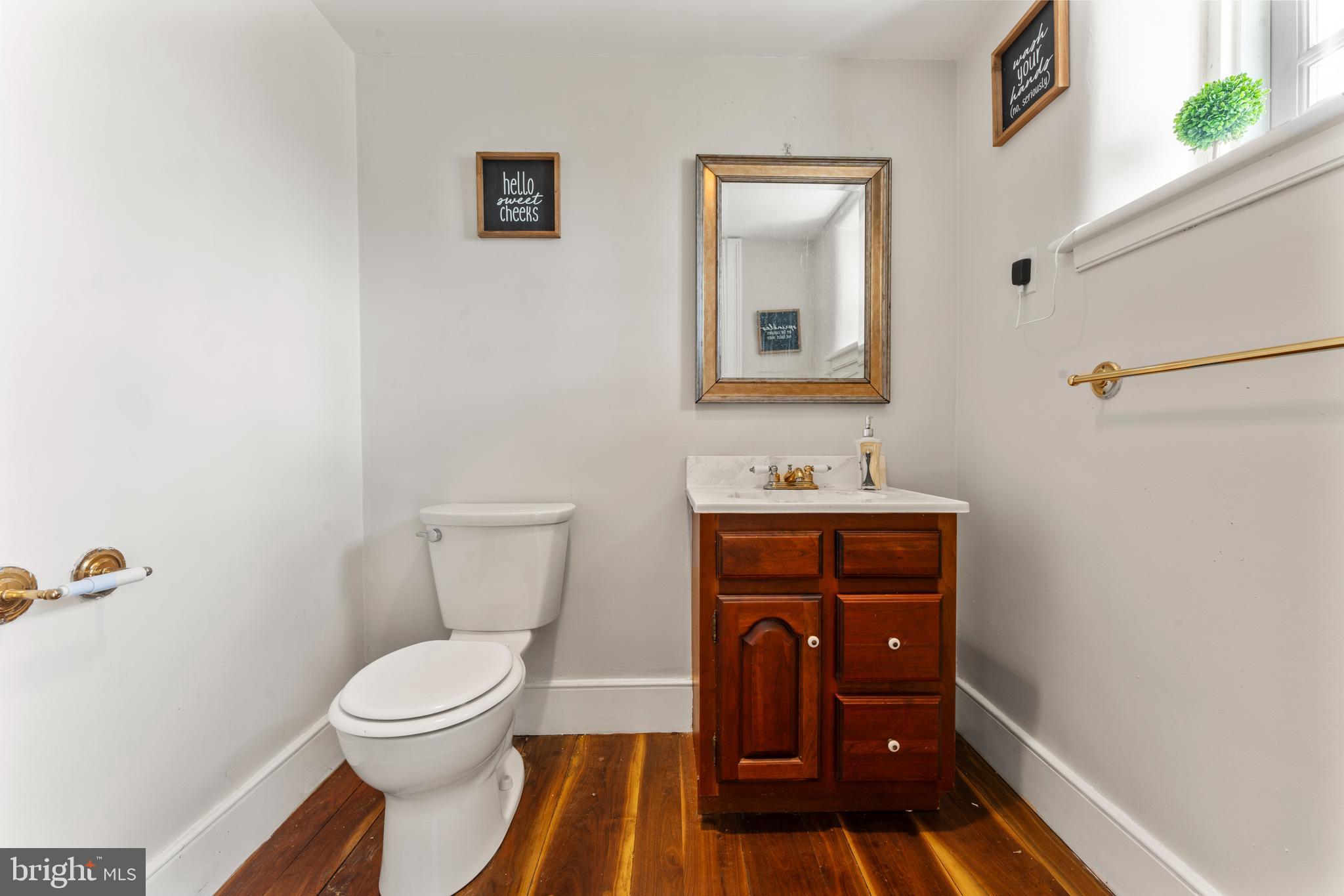 2141 Paper Mill Road Huntingdon Valley, PA 19006 - Photo 17 of 58 a bathroom with a sink and a toilet