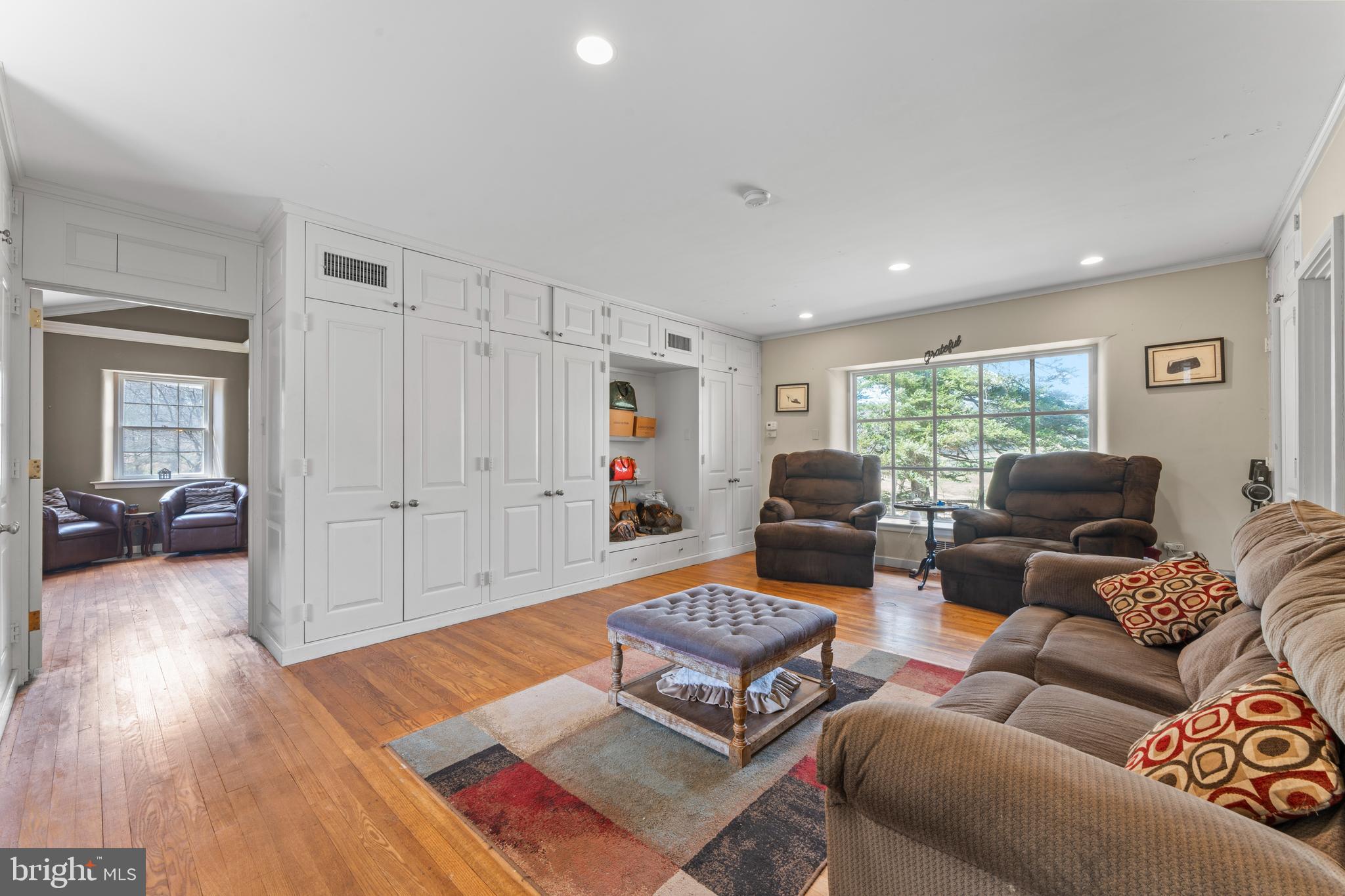 2141 Paper Mill Road Huntingdon Valley, PA 19006 - Photo 27 of 58 a living room with furniture and a wooden floor