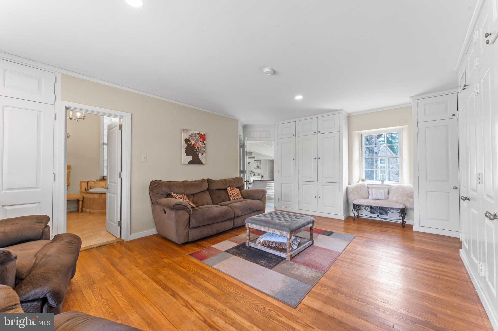 2141 Paper Mill Road Huntingdon Valley, PA 19006 - Photo 28 of 58 a living room with furniture and a wooden floor